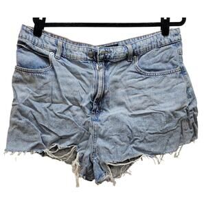 ASOS DESIGN denim relaxed shorts with rips in light blue